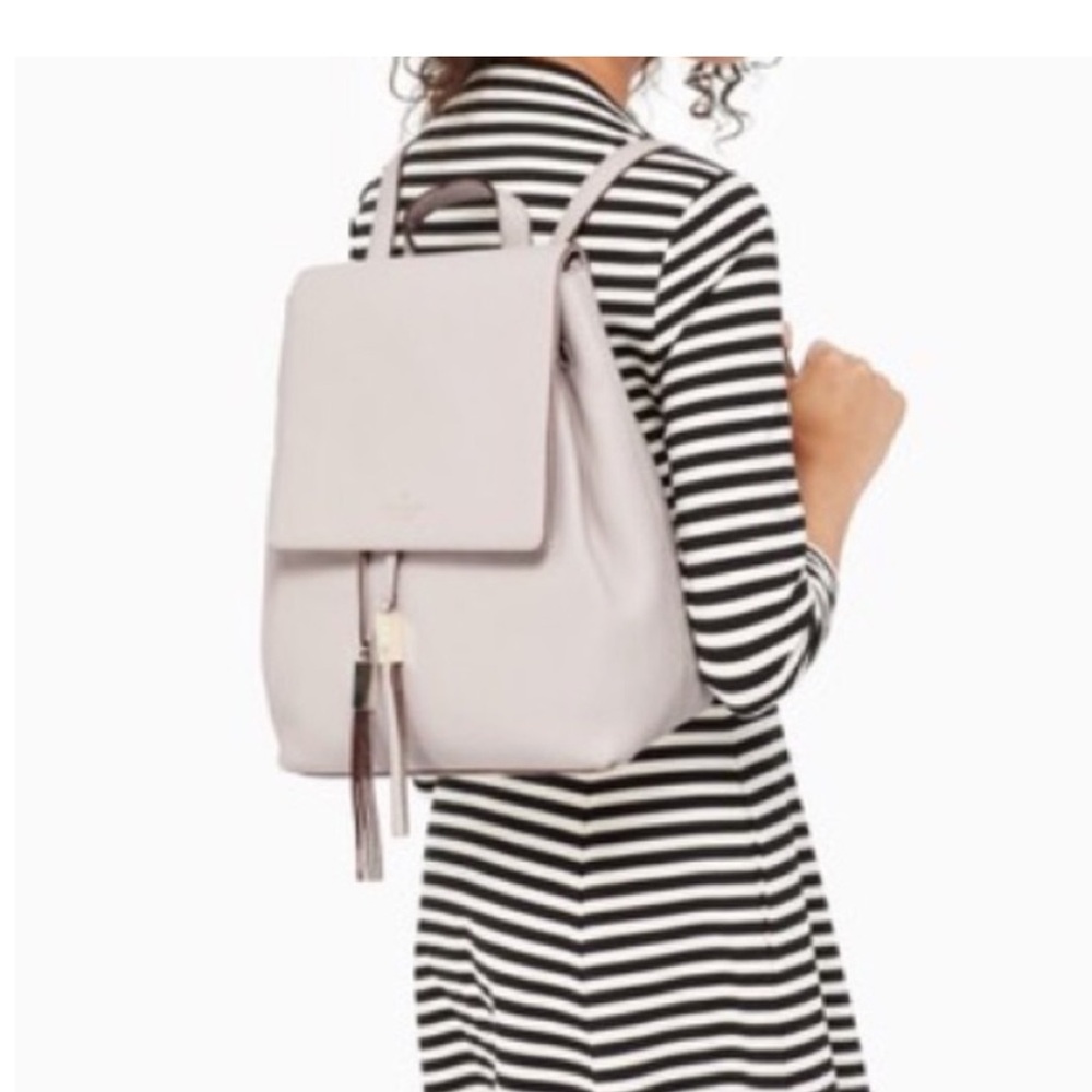 Kate spade light pink pebbled leather backpack.